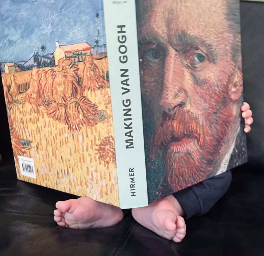 Our Lead Designer reading the Van Gogh Imprint